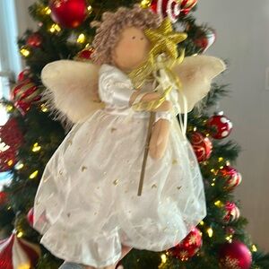 Angel with star wand  weighed bottom stands approximately 13.5” tall